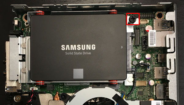 Lenovo M900 Tiny showing how to remove HDD caddy